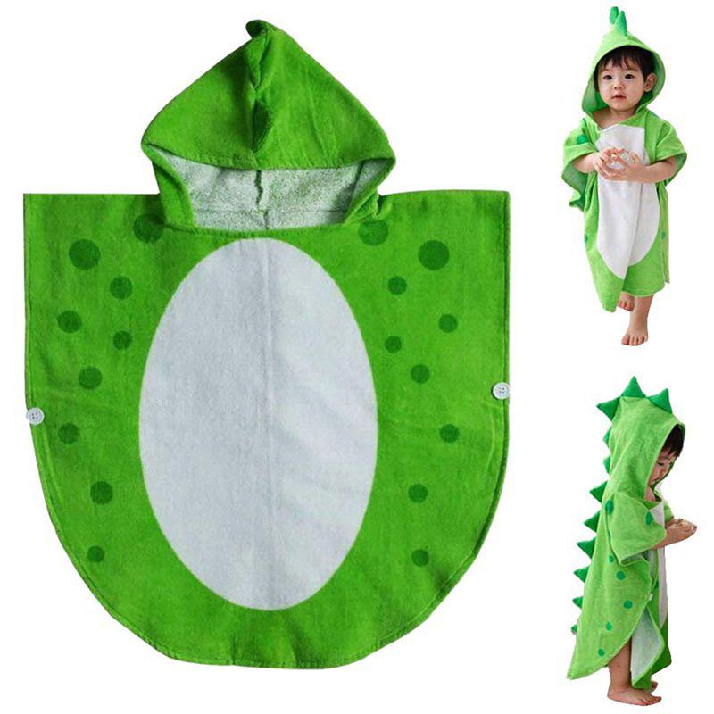 Poncho enfant motif dinosaure